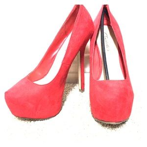 Red stiletto pumps- never worn!